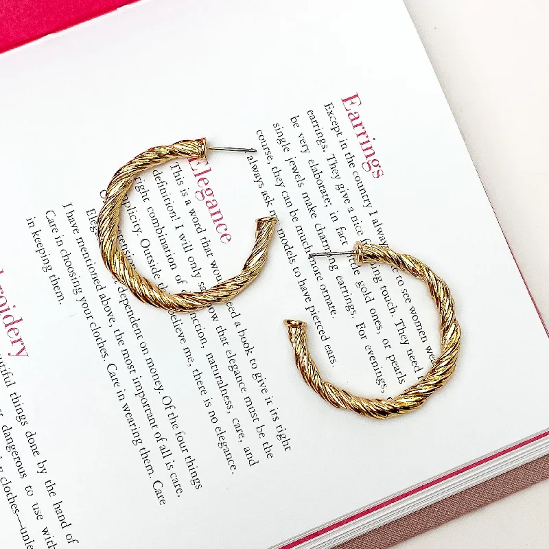 Designer Earrings for Special Occasions-Anything Goes Twisted Medium Hoop Earrings in Gold Tone